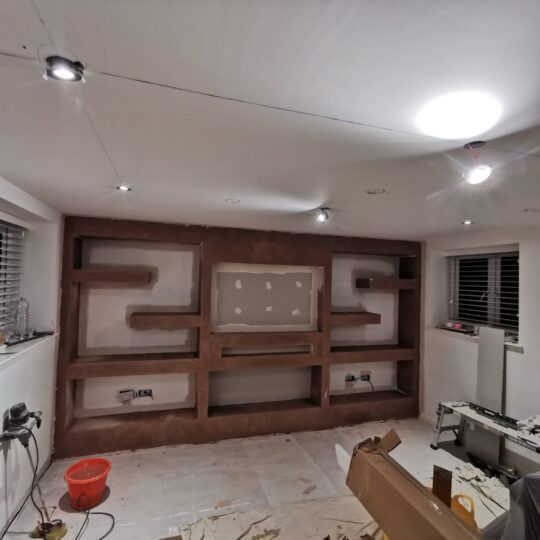Plastering Wall to Wall Media Wall Installation in Greenwich by DEAL