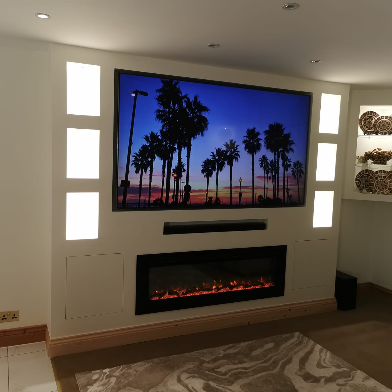 London, Stratford - Media Wall & Soundbar and Fireplace Installation by DEAL